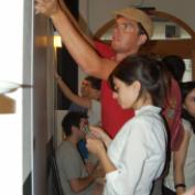 the first participants attach their cards to the Decide Arazzo
